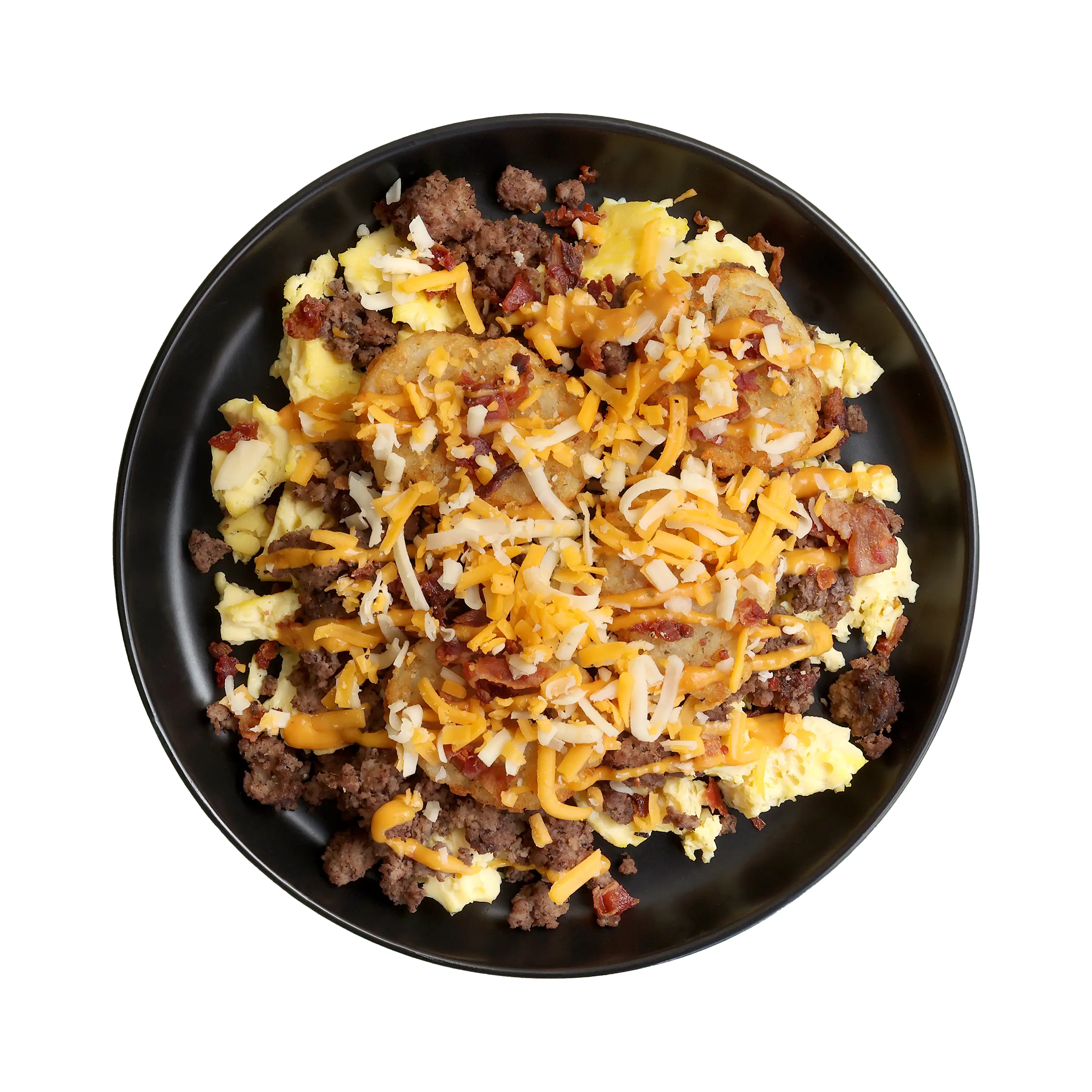 Brunch Burger Bowl with scrambled eggs, ground beef, hash brown rounds, bacon, shredded cheese, and sauce in a black bowl